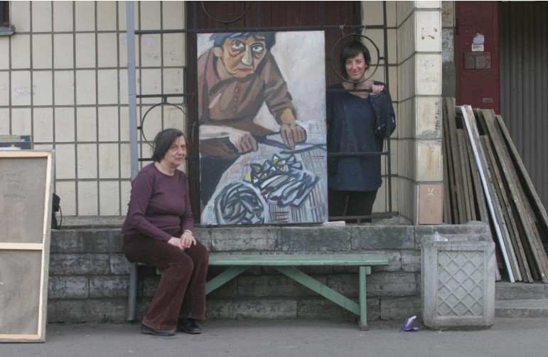 A woman cutting fish.